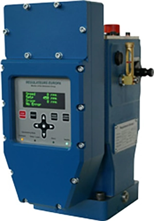 A blue industrial control panel with a digital display screen showing green numbers. The panel features various buttons and a knob.