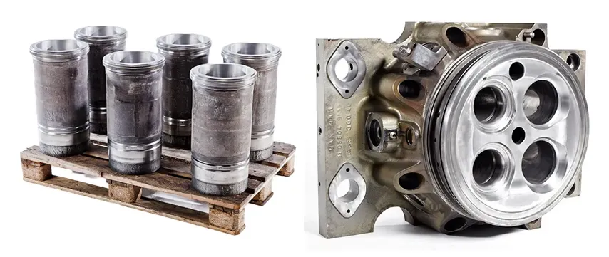 Cylinder parts on a wooden pallet and a close-up of a hydraulic pump. Industrial equipment components.